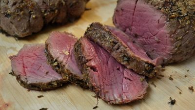 Буженина говяжья с чесноком и морковью в духовке