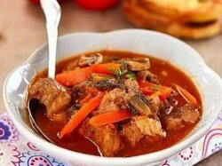 Тушеная телятина с шампиньонами «Маренго»