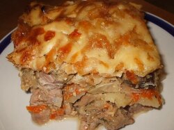 Запеченное мясо с овощами и грибами в духовке