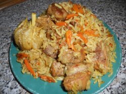 Настоящий плов из свинины в казане на плите