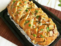 Фаршированный батон с сосисками в духовке