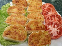 Рулет из лаваша с картошкой, морковью и сыром