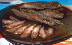 Карпаччо из курицы с рукколой