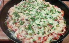 Кабачок под помидорами и сыром в духовке