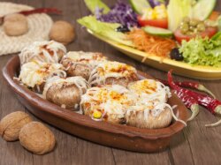 Фаршированные грибы с сыром и корнишонами