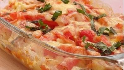 Запеченные в духовке кабачки под сыром с помидорами